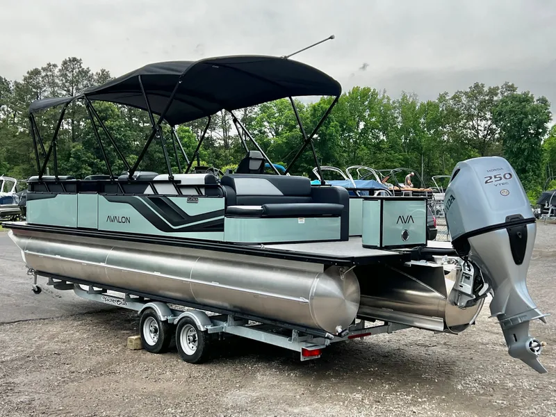 Slide: The Image of 2026 Avalon Venture 85 pontoon boat with Honda 250 engine, on trailer. - 3