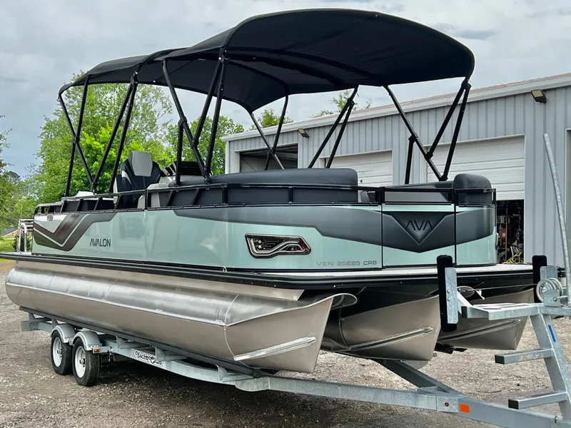 Slide: The Image of 2026 Avalon Venture 85 pontoon boat on trailer, in stock, $78,637. - 7