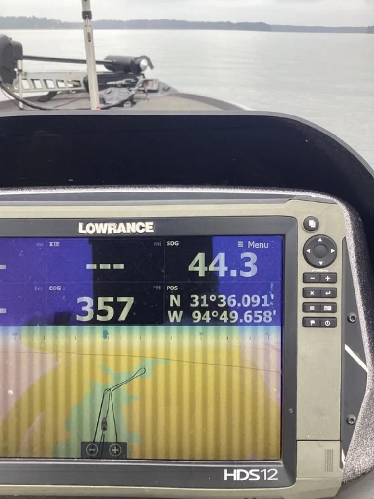 Slide: The Image of Lowrance GPS on Skeeter ZX250 boat, speed 44.3, coordinates 31°36.091'N 94°49.658'W. - 10