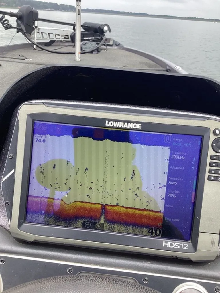 Slide: The Image of Lowrance fishfinder on Skeeter ZX250 boat, displaying underwater structures. - 22