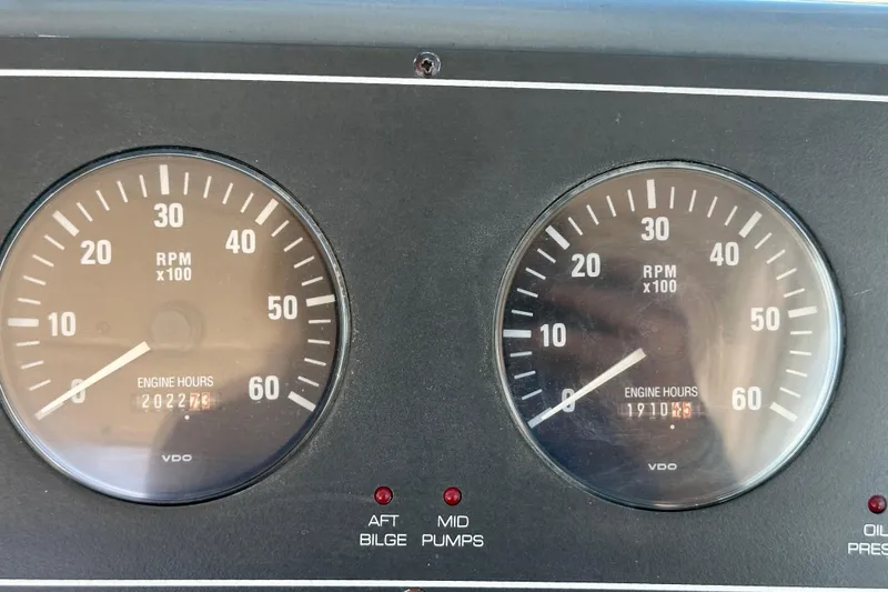 Slide: The Image of Close-up of Tiara Yachts 2900 Coronet 1998 engine hour meters displaying RPM and hours. - 17
