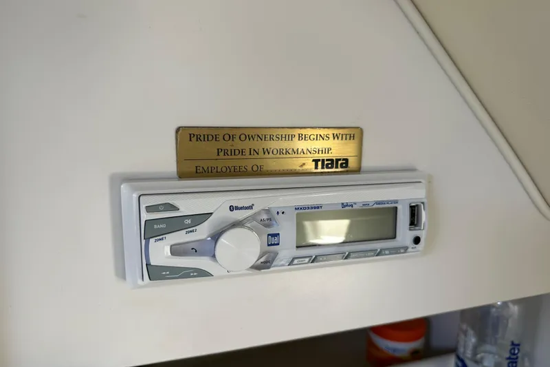 Slide: The Image of 1998 Tiara Yachts 2900 Coronet interior with stereo and pride plaque. - 27