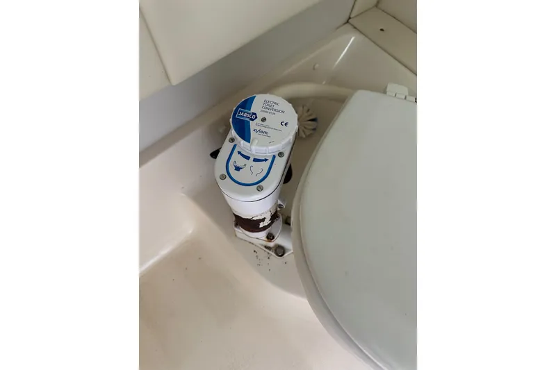 Slide: The Image of Electric marine toilet in 1998 Tiara Yachts 2900 Coronet, featuring Jabsco conversion kit. - 30