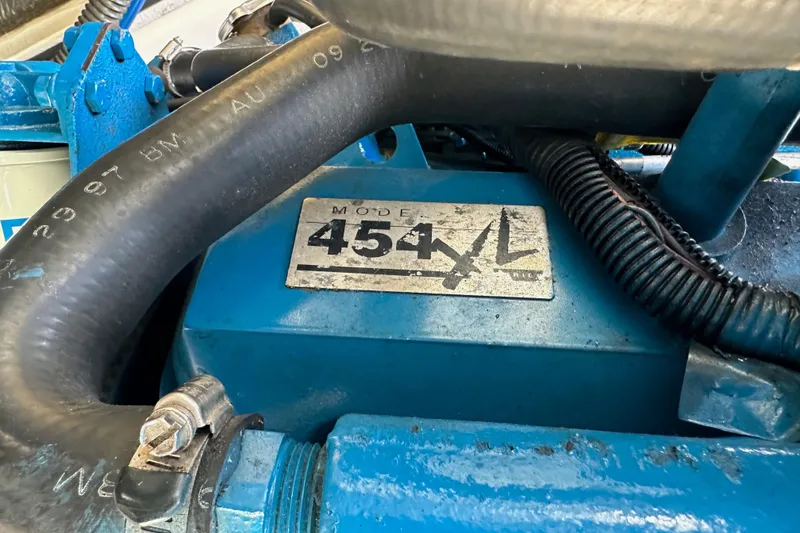 Slide: The Image of Engine compartment of a 1998 Tiara Yachts 2900 Coronet, featuring a Model 454XL engine. - 39