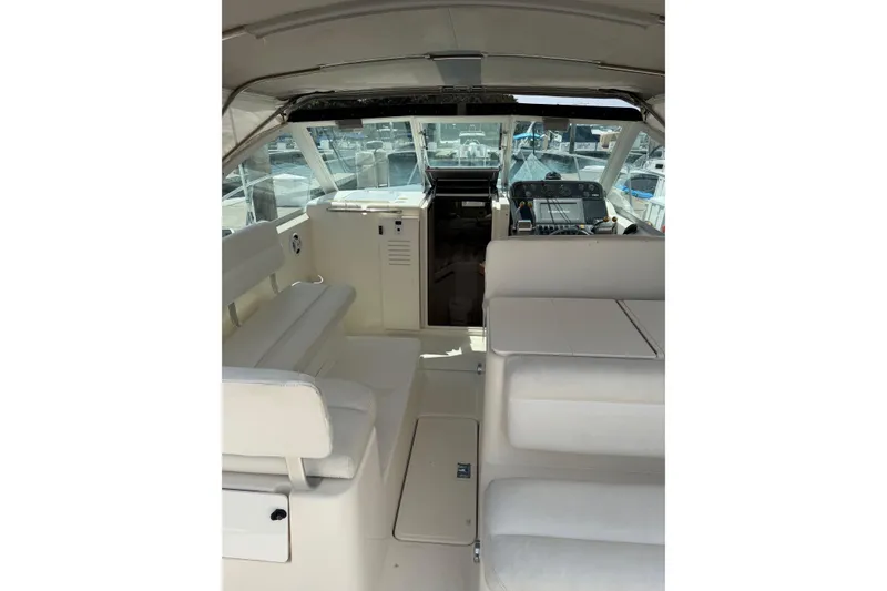 Slide: The Image of 1998 Tiara Yachts 2900 Coronet interior with helm, seating, and dashboard view. - 42