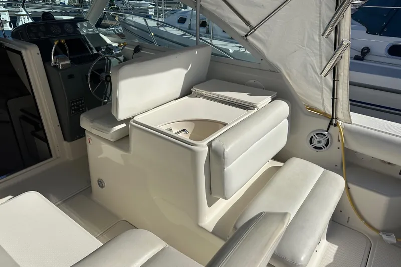 Slide: The Image of 1998 Tiara Yachts 2900 Coronet interior with helm, seating, and nautical equipment. - 8