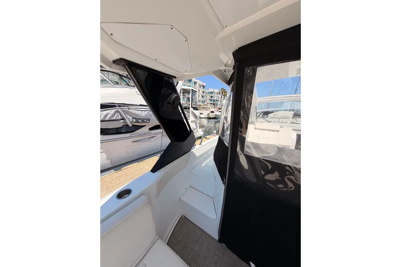 Slide: The Image of 2020 Cruisers Yachts 390 Express Coupe interior view at marina. - 19