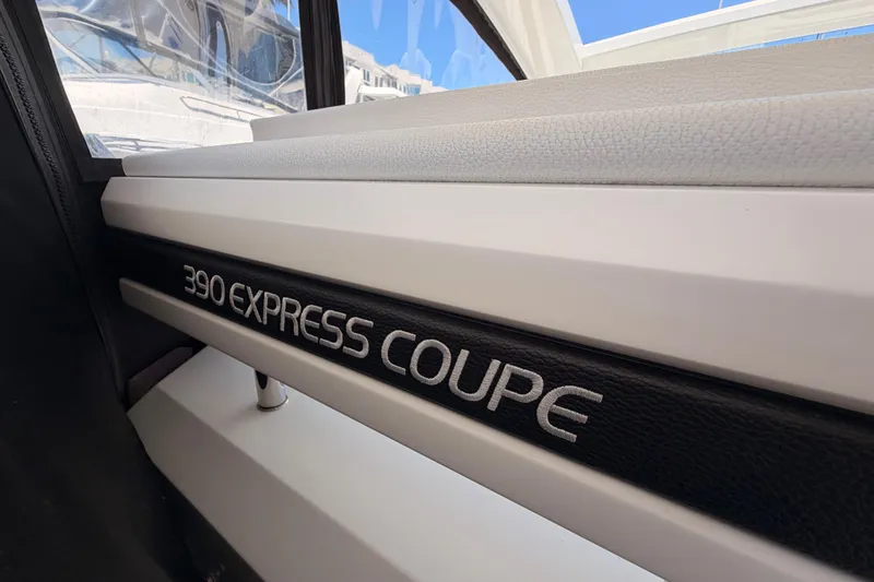 Slide: The Image of 2020 Cruisers Yachts 390 Express Coupe interior detail with model name displayed. - 32