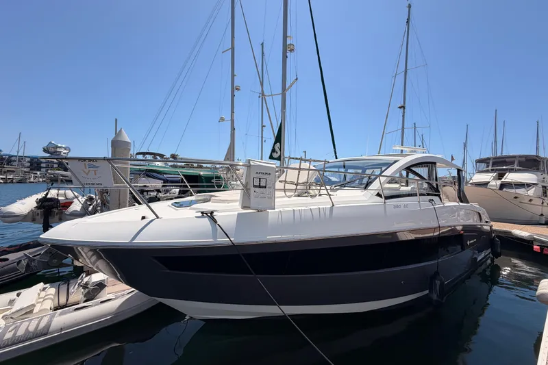 Slide: The Image of 2020 Cruisers Yachts 390 Express Coupe docked at marina, sunny day. - 6