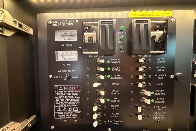 Slide: The Image of Electrical control panel on a 2020 Cruisers Yachts 390 Express Coupe. - 65