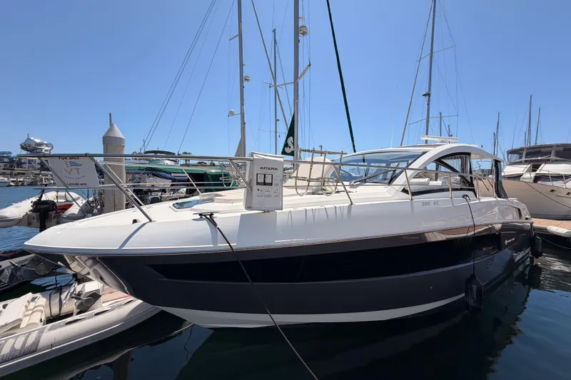 Slide: The Image of 2020 Cruisers Yachts 390 Express Coupe docked at marina, sleek design, for sale. - 7