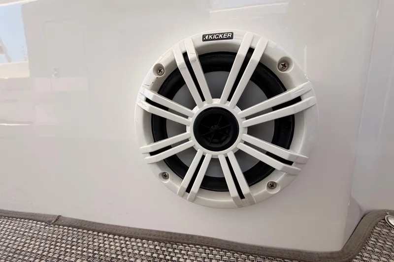 Slide: The Image of Kicker speaker on 2020 Cruisers Yachts 390 Express Coupe, white grille design. - 76