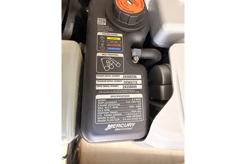Slide: The Image of Engine specifications label on a 2020 Cruisers Yachts 390 Express Coupe. - 88