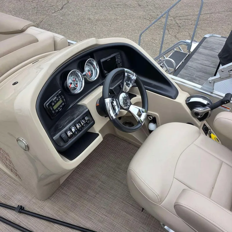 Slide: The Image of Interior view of a 2017 Tahoe CASCADE boat helm. - 6