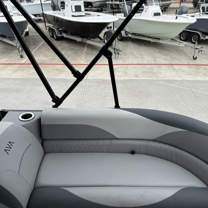 Slide: The Image of Interior of Avalon Venture 85 Quad Lounge 2025 with gray upholstery. - 24