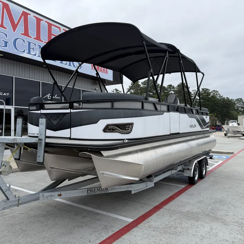 Slide: The Image of 2025 Avalon Venture 85 Quad Lounge pontoon boat on trailer. - 3