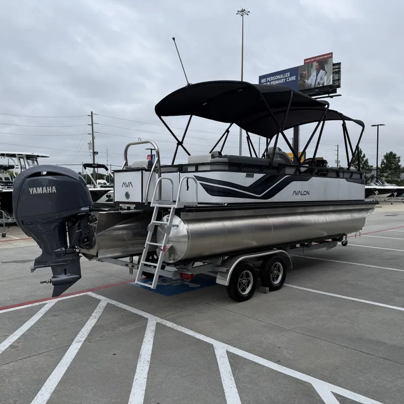 Slide: The Image of 2025 Avalon Venture 85 Quad Lounge pontoon boat on trailer. - 8