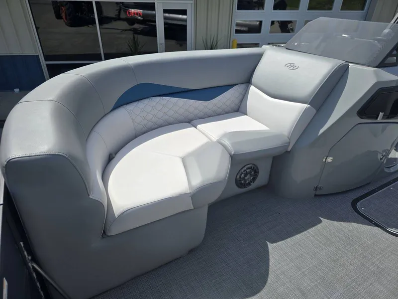 Slide: The Image of Luxurious seating in the 2022 Manitou 23 Encore RF SHP boat. - 10