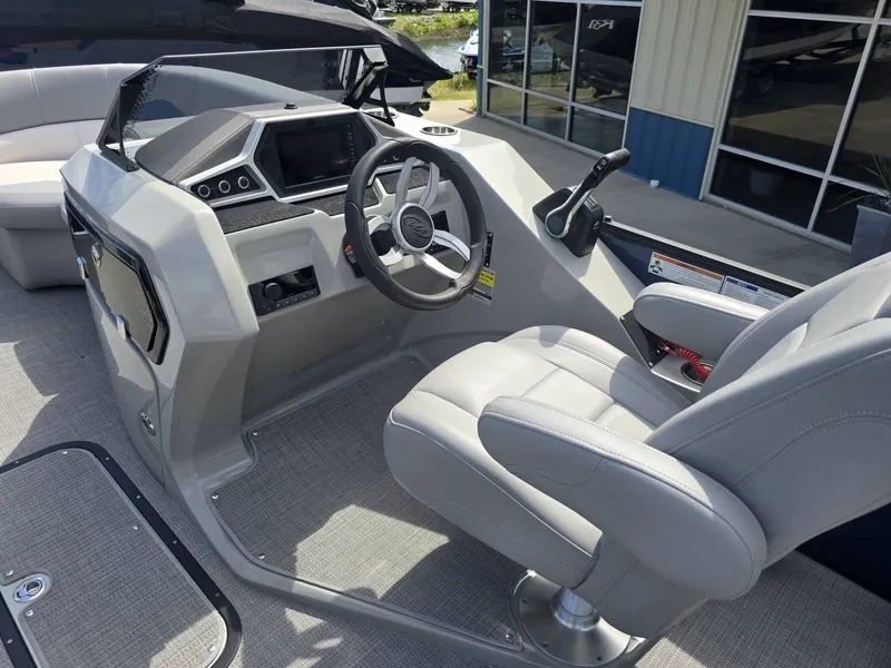 Slide: The Image of Interior view of 2022 Manitou 23 Encore RF SHP boat. - 12