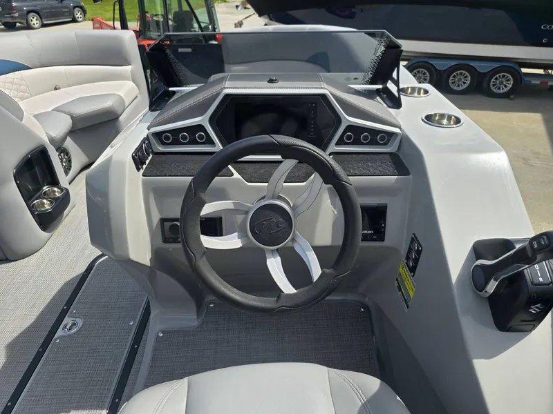 Slide: The Image of Interior view of the 2022 Manitou 23 Encore RF SHP boat. - 13