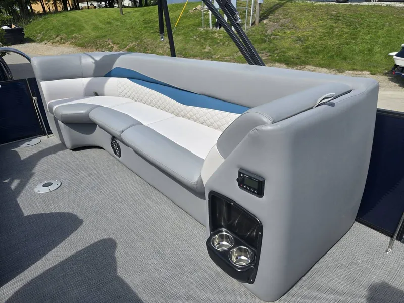 Slide: The Image of Interior of 2022 Manitou 23 Encore RF SHP with gray upholstery. - 16