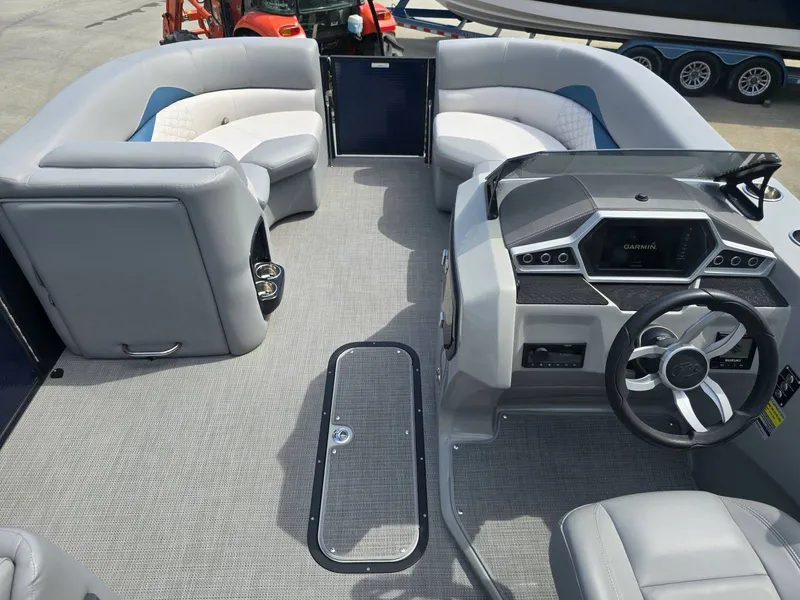 Slide: The Image of Interior of 2022 Manitou 23 Encore RF SHP with modern helm. - 17