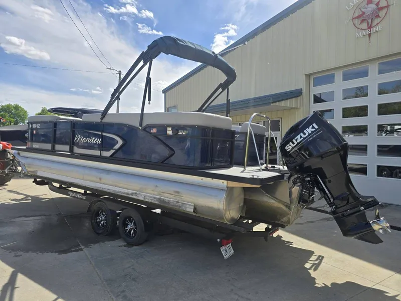 Slide: The Image of 2022 Manitou 23 Encore RF SHP pontoon boat with Suzuki engine. - 3