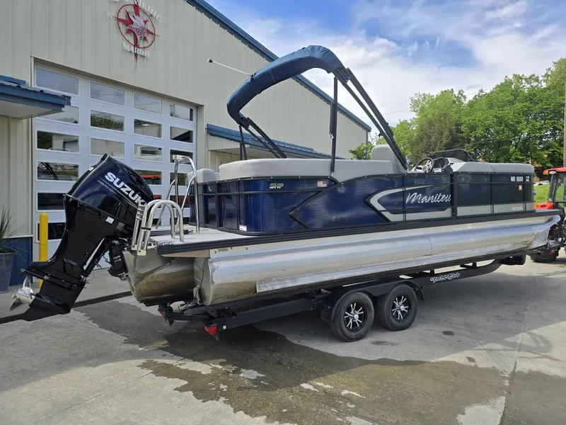 Slide: The Image of 2022 Manitou 23 Encore RF SHP pontoon boat with Suzuki engine. - 4