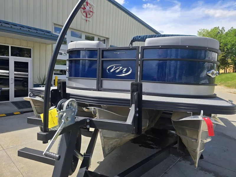 Slide: The Image of 2022 Manitou 23 Encore RF SHP pontoon boat on trailer. - 7