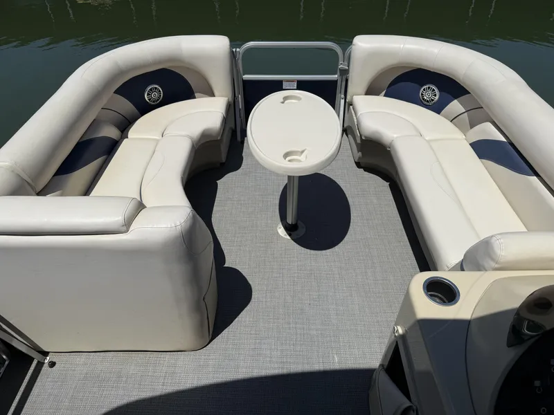 Slide: The Image of Interior of a 2016 SunChaser 8524 LR pontoon boat with seating. - 12