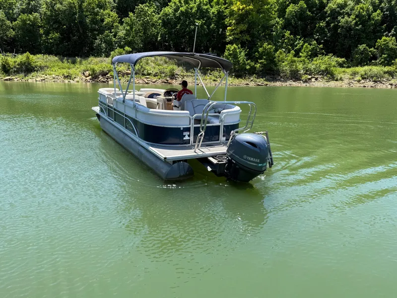 Slide: The Image of SunChaser 8524 LR pontoon boat on green water, 2016 model. - 20