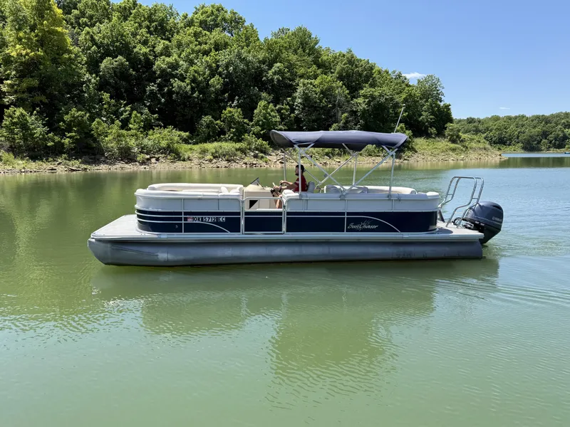 Slide: The Image of 2016 SunChaser 8524 LR pontoon boat on a calm lake. - 4
