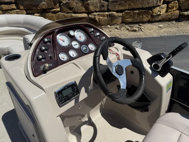 Slide: The Image of Cockpit of a 2013 SunChaser 8520 4.0 RE pontoon boat. - 4