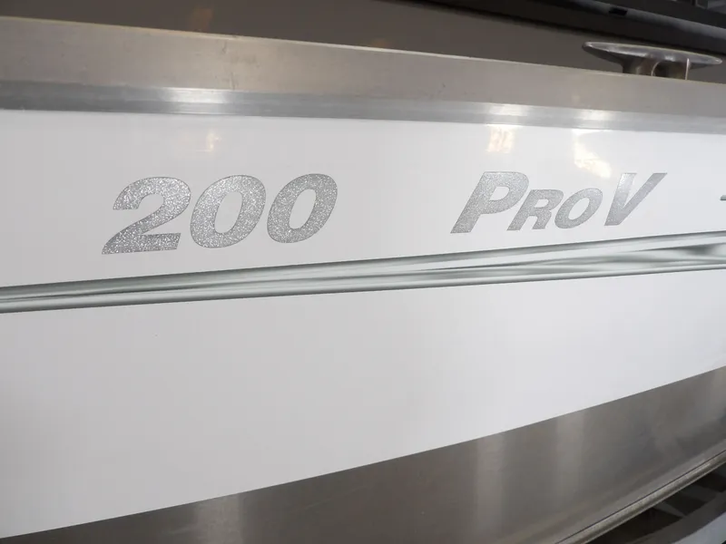 Slide: The Image of Close-up of 2018 Hewescraft 20 PRO V boat logo. - 12