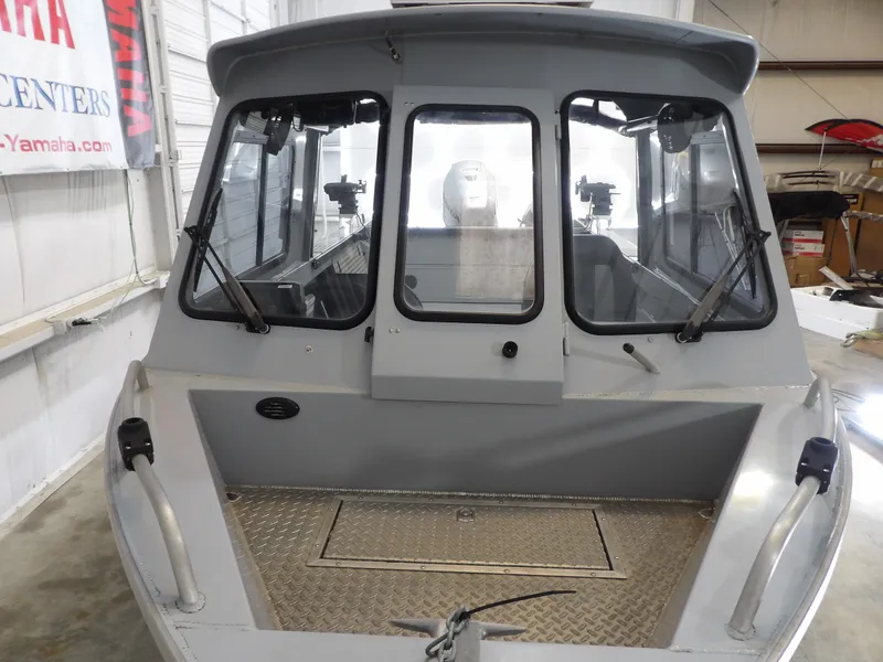 Slide: The Image of 2018 Hewescraft 20 PRO V boat in a storage facility. - 14