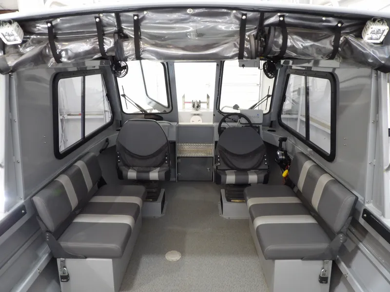 Slide: The Image of Interior of a 2018 Hewescraft 20 PRO V boat with seating. - 16