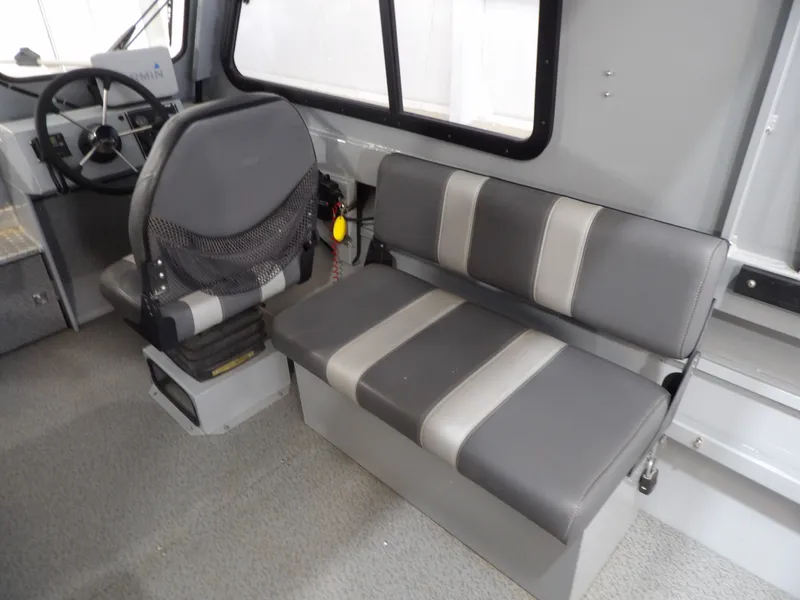 Slide: The Image of Interior of a 2018 Hewescraft 20 PRO V boat with seating. - 20