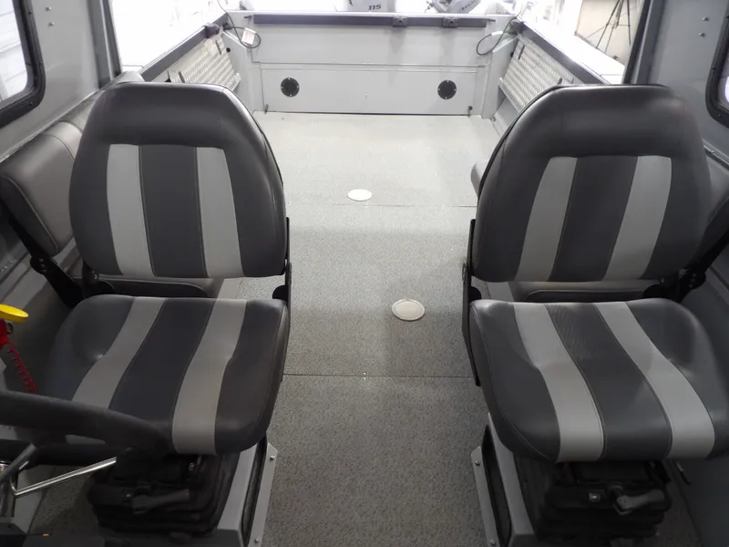 Slide: The Image of Interior of a 2018 Hewescraft 20 PRO V with two gray seats. - 7