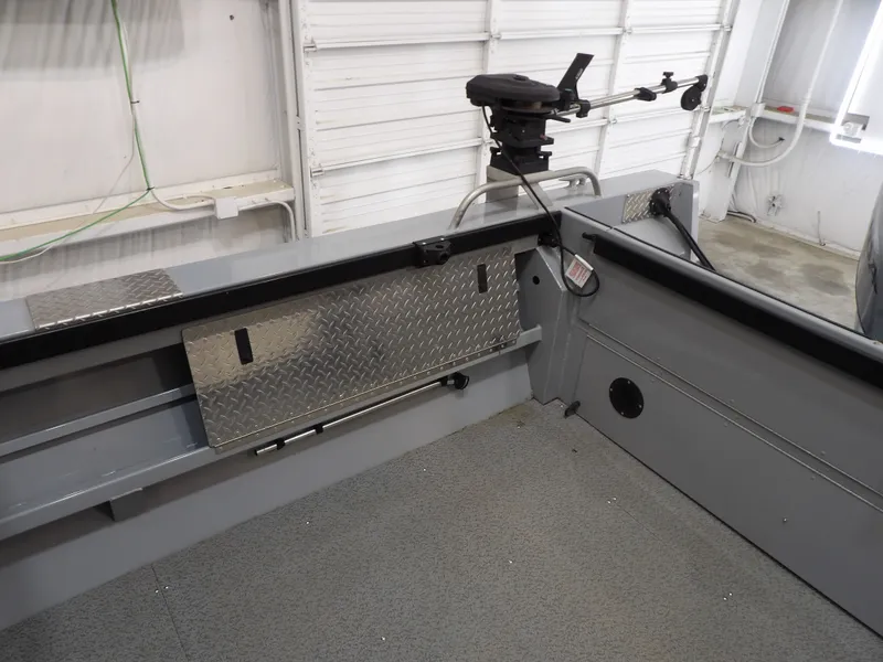 Slide: The Image of Interior of a 2018 Hewescraft 20 PRO V boat with storage area. - 8