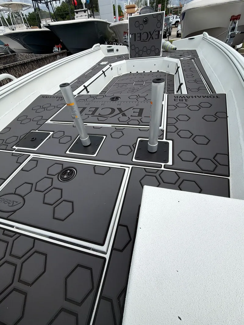 Slide: The Image of Deck of Excel 183 Tomahawk boat, 2026 model, featuring hexagonal pattern. - 5