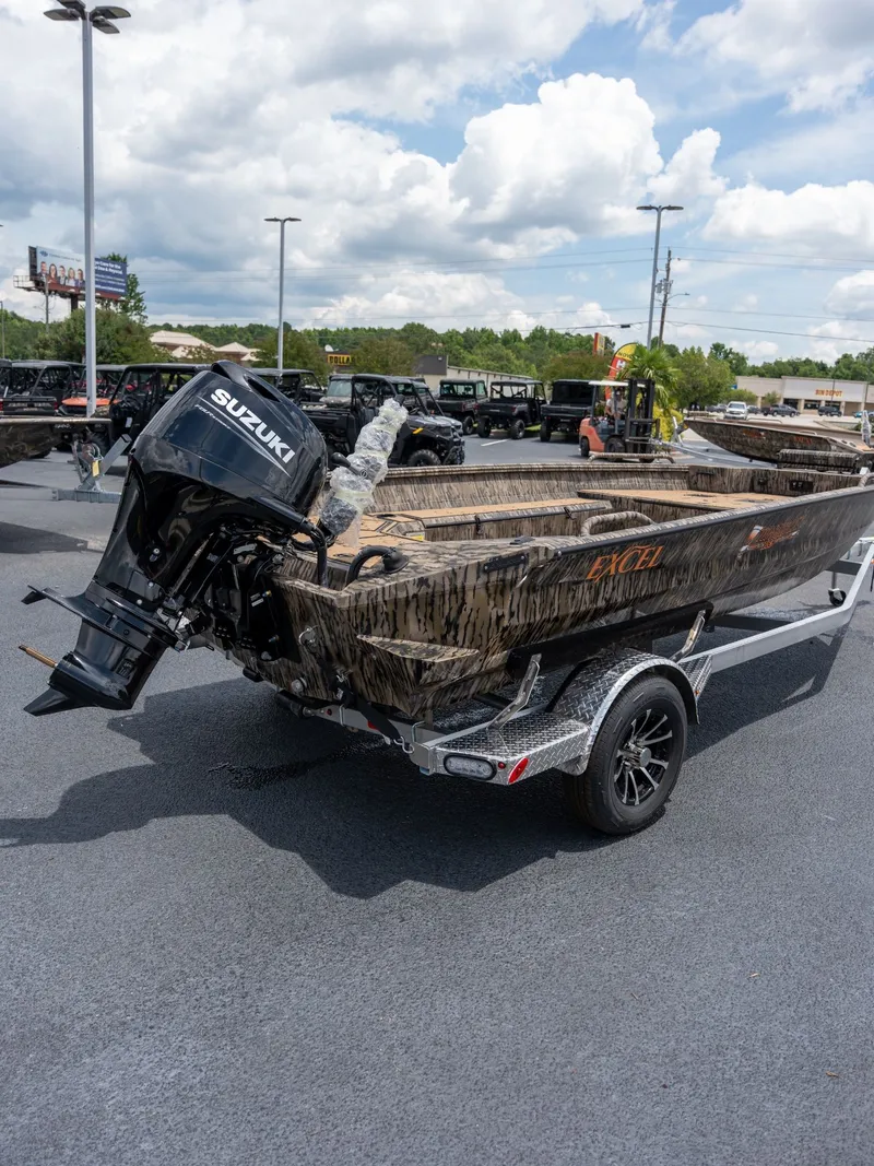 Slide: The Image of Excel 183 Tomahawk boat 2026 with Suzuki engine on trailer. - 5