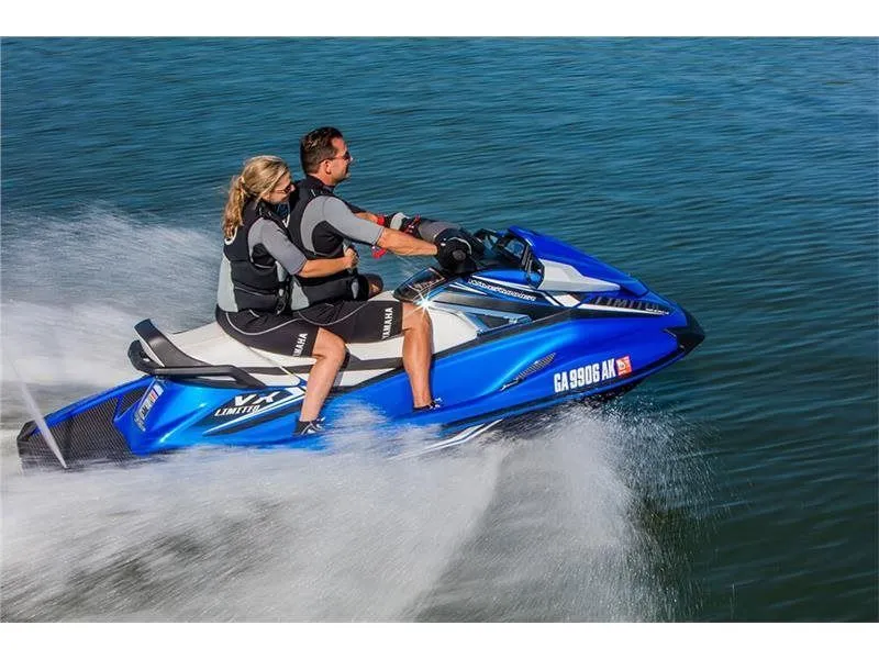 Slide: The Image of 2017 Yamaha VX Limited jet ski with two riders on water. - 3