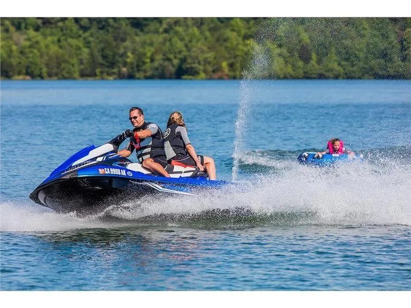Slide: The Image of 2017 Yamaha VX Limited jet ski on a lake with tubing. - 6