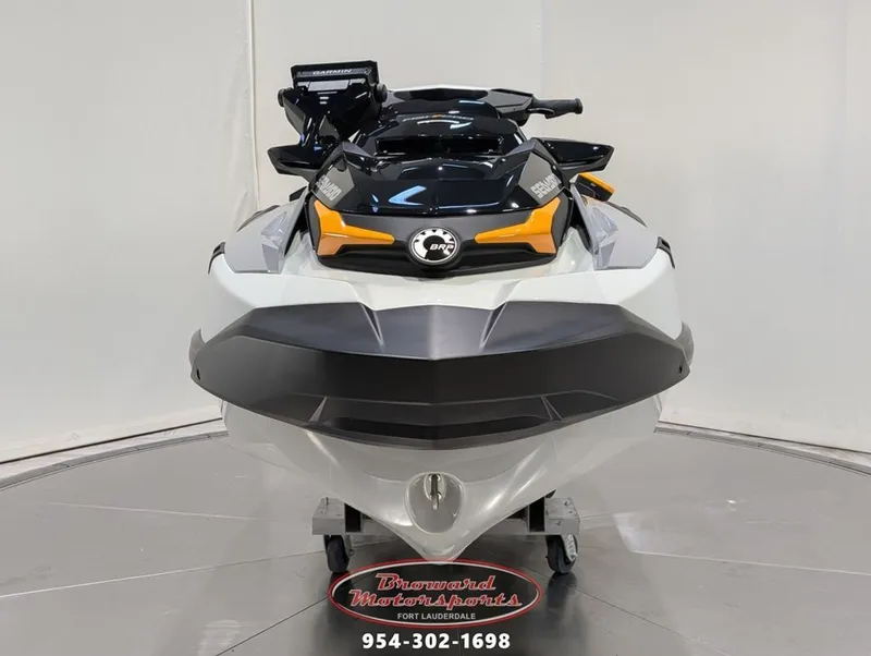Slide: The Image of 2025 Sea-Doo FishPro Trophy 170 jet ski, front view, white and black. - 2