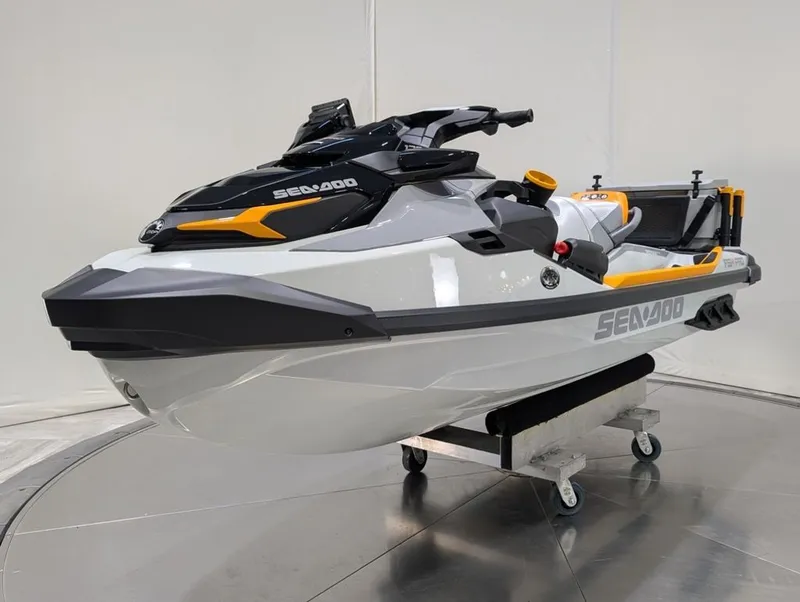Slide: The Image of 2025 Sea-Doo FishPro Trophy 170 jet ski in a showroom. - 31