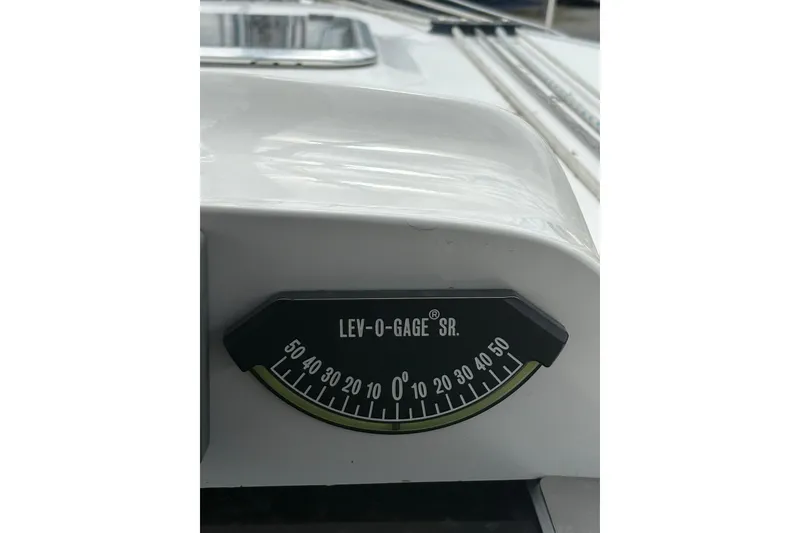 Slide: The Image of Level gauge on 2009 Hunter 41 Deck Salon sailboat, displaying tilt angles. - 22