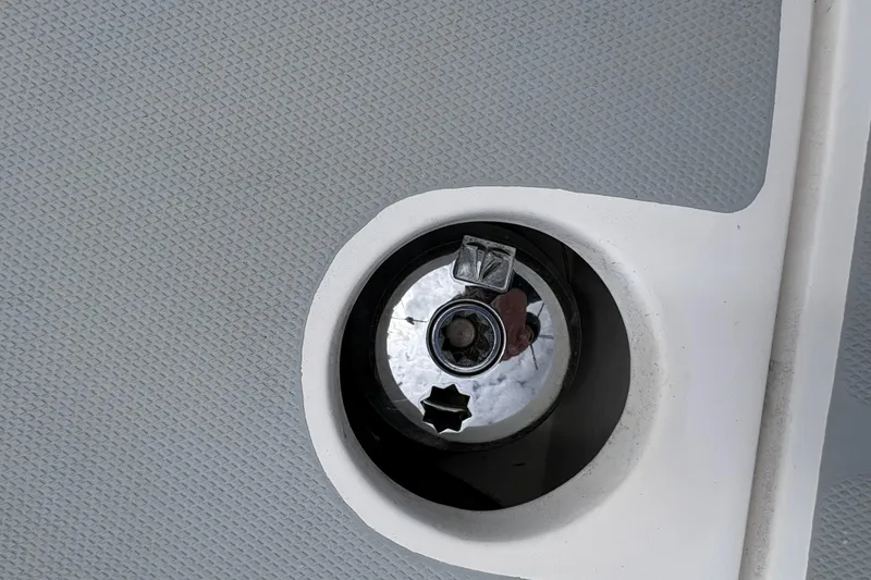 Slide: The Image of Close-up of a 2009 Hunter 41 Deck Salon boat fitting on textured surface. - 26