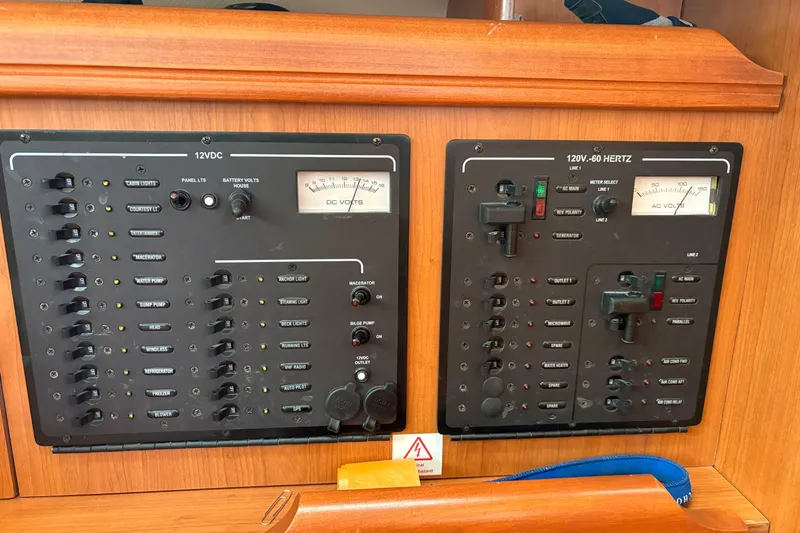 Slide: The Image of Electrical control panel on a 2009 Hunter 41 Deck Salon yacht. - 48