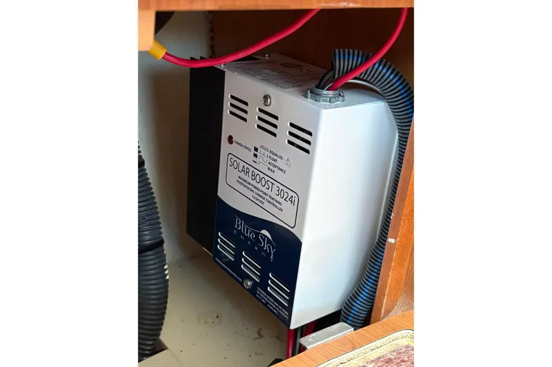 Slide: The Image of Solar Boost 3024i controller in 2009 Hunter 41 Deck Salon yacht, enhancing solar efficiency. - 53