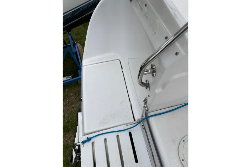 Slide: The Image of Hunter 41 Deck Salon 2009 yacht deck with stainless steel railing and storage compartment. - 7